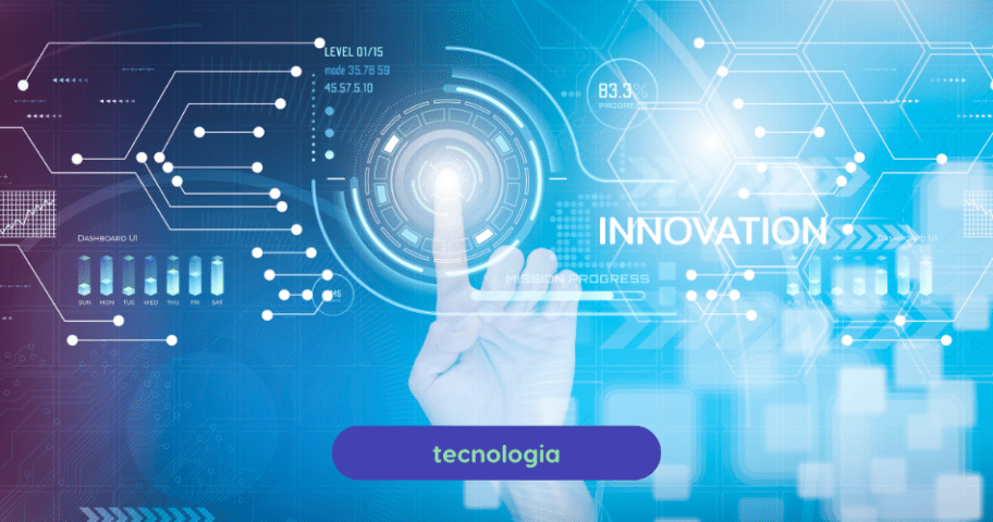 Descrição de Imagem: uma interface digital futurística, destacando um dedo humano tocando um ícone circular iluminado, simbolizando inovação. Ao fundo, gráficos, dados e conectores digitais ressaltam o conceito de tecnologias emergentes, que são fundamentais para a evolução e inovação no desenvolvimento de software.